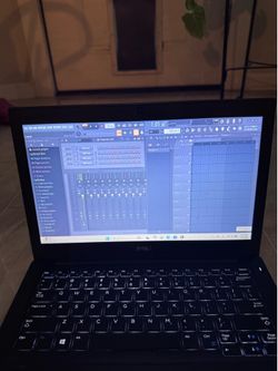 DELL 12 INCH LAPTOP WITH FL STUDIO FREE DELIVERY WITHIN THE CITY