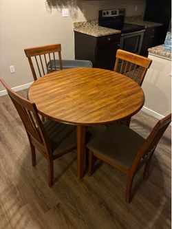 Table and four chairs