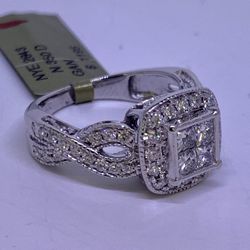 14 karat solid white gold and 1.25 carat princess diamond engagement ring