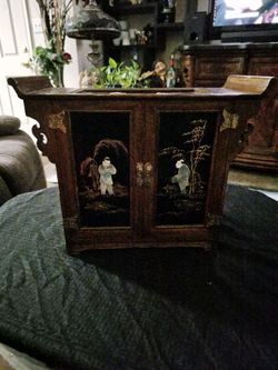Oriental jewelry box price. $60. As they try to talk about