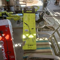 RYOBI
40V 10 in. Cordless Battery
Chainsaw with 2.0 Ah Battery
and Charger
