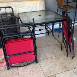 Porch table for red new chair in plastic
