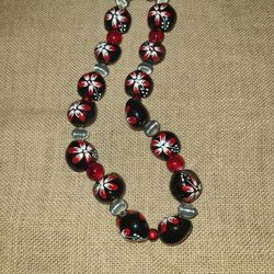 Womens Black Kukui Nut  with Flowers Accented with Red & Silver Beads Necklace