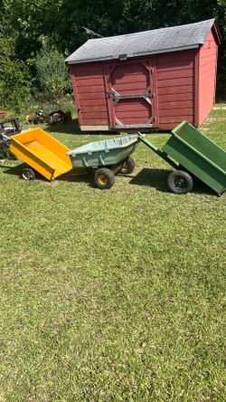 Utility trailers pull behind a ride mower