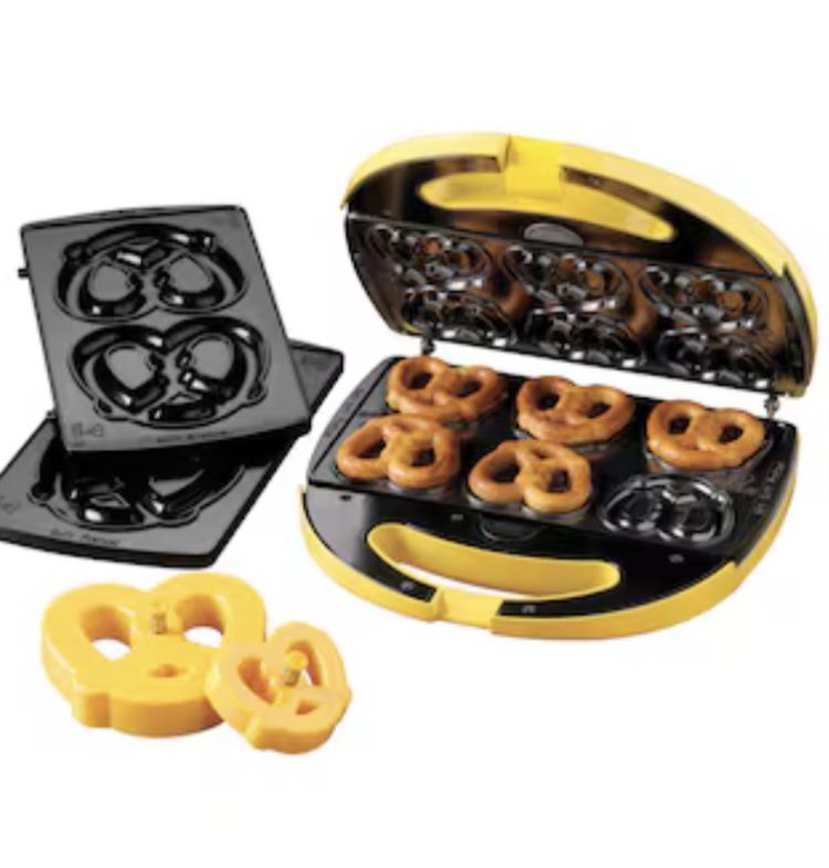 Nostalgia Soft Pretzel Factory Pretzel Maker Makes 2 large or 6 small soft pretzels at 1 time Non-stick coating Includes pretzel cutting tool 3-7 minu