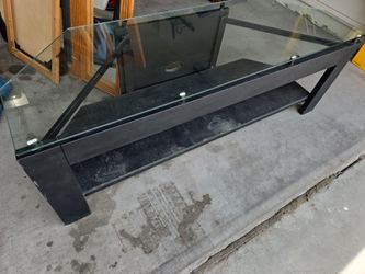 Glass top entertainment stand