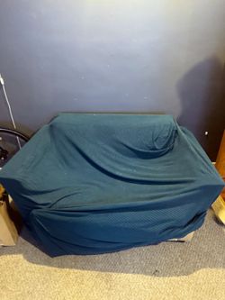 Loveseat with Green Slipcover