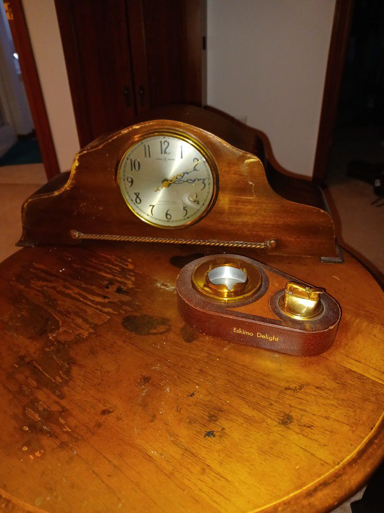 G.E clock and an EVANS FUEL lighter/ Ashtray. Ocean Estate 