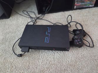 Playstation 2 + 5 games