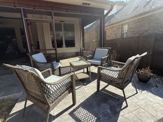 Table with 4 Lawn chairs and cushions moving out sale