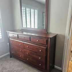 Dresser with mirror and 2 nightstands