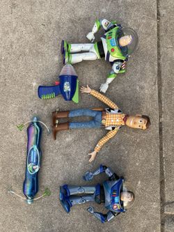 TOY STORY BUZZ AND WOODYS + LAZERS -take all for $15. Firm price in eagle rock
