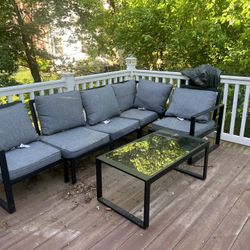 2 Outdoor Modular Couches with glass coffee table and covers
