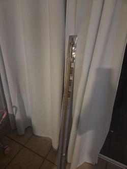 Decorative metal rods set one half diameter, two inches projection