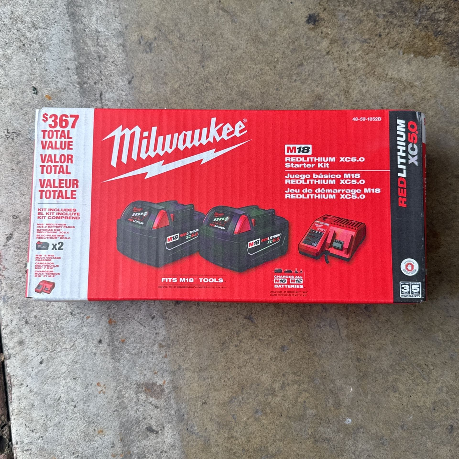 Milwaukee 2 Battery Kit With Charger.