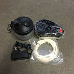 New in box $20 mini airbrush compressor with glass cleaning pot air hose