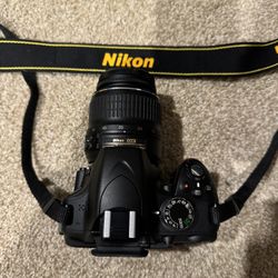 Nikon D3200 with 18-55 and 55-200mm lenses 
