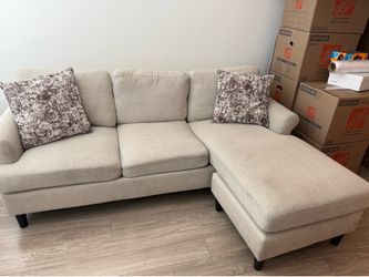 Beige sectional sofa with  right facing chaice