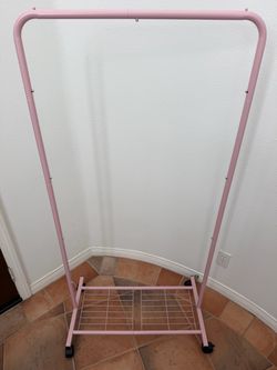 Pink Rolling Cloths Rack