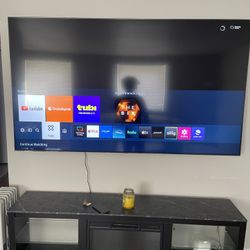 Kruszewski 70" TV Stand for TVs up to 75-inch TV with Fireplace Included