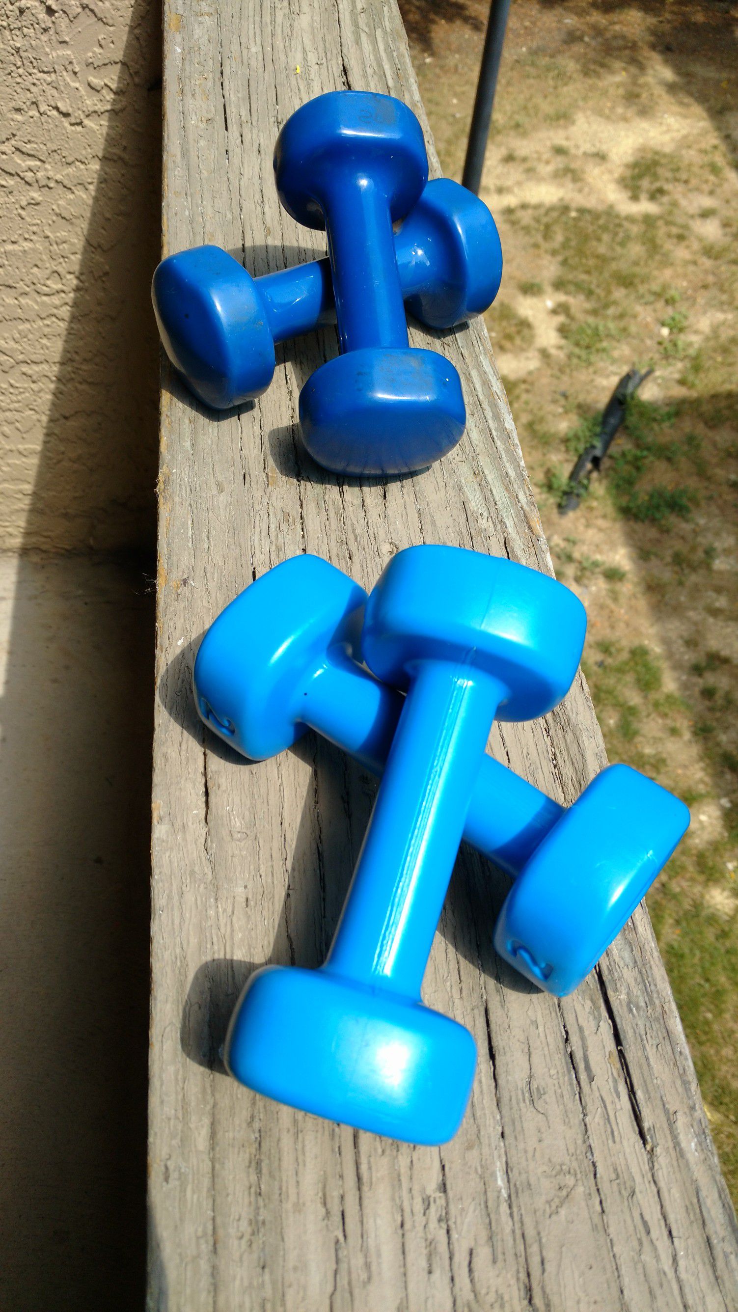 Set of four blue dumbbells 5 pounds and 2 lb Price Reduced