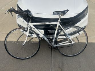 White mountain bike (padding) & shoes