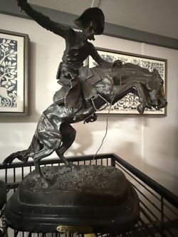 Copyrighted in  1895-  Frederick Remington signed bronze sculpture “Busting Bronco!” 