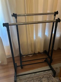 Two Rolling Clothes Rack