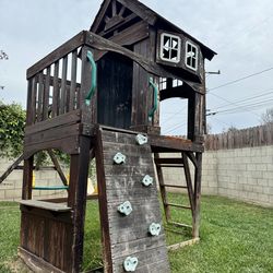 Free Backyard Discovery Wooden Playhouse