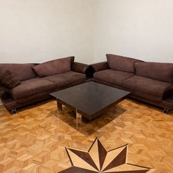 3 Brown couches, 2 tables