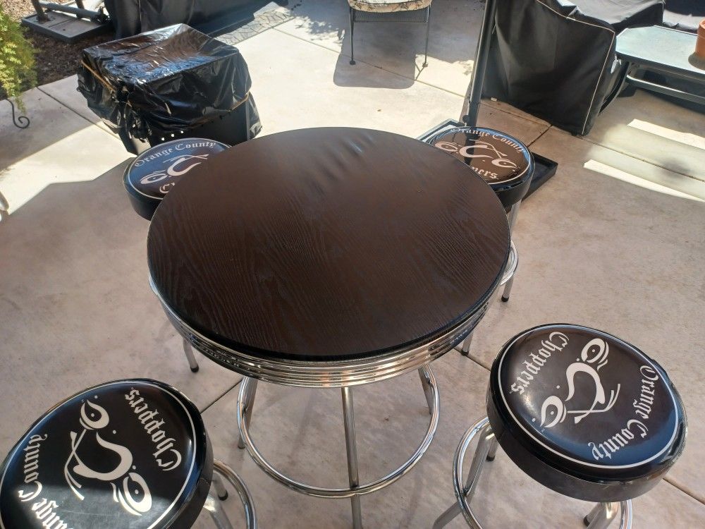4 Orange County Chopper Stools And Chrome Pub Table
