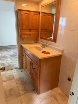 Vanity with counter and mirrow- not free, shoot me an offer
