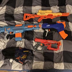 Nerf Guns And Bag Of Bullets