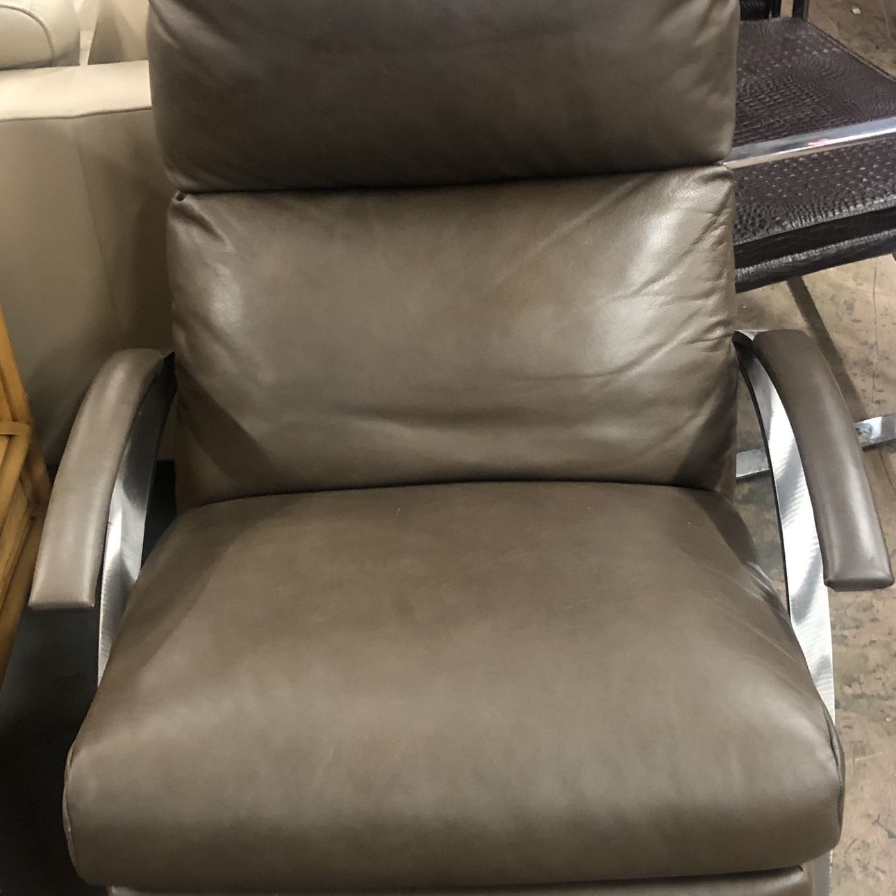 Beautiful Designer Recliner With Chrome Base