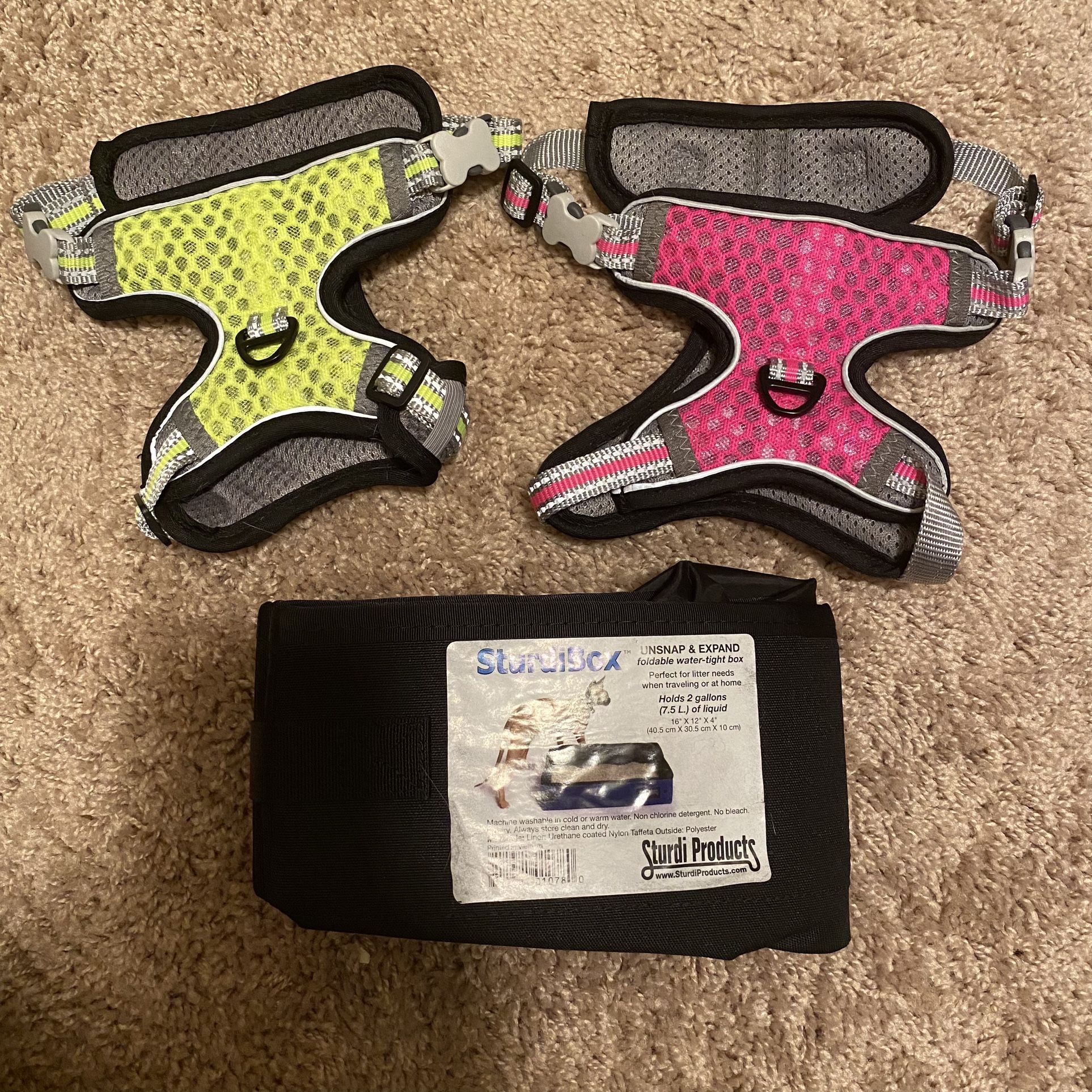 Cat Product Bundle - Collapsible Portable Sturdi Litter Box and 2 Full Body Harnesses  All in great pre-owned condition.  Sturdi Box - 2 Gallon Black.