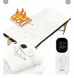Massage table warmer