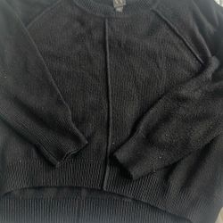Black sweater if it’s an extra large