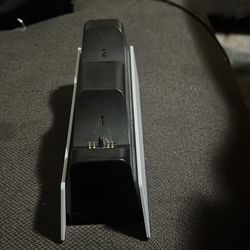 PlayStation 5 DualSense wireless controller charging station dock.