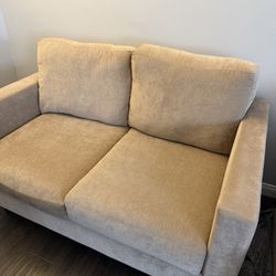 BRADLEY KHAKI LOVESEAT (Living Spaces)