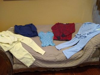 Two medium PJs, one medium sweat shirt, one medium sweater, one small short sleeves top