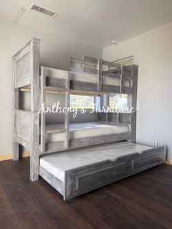 Twin bunk bed with mattress and trundle