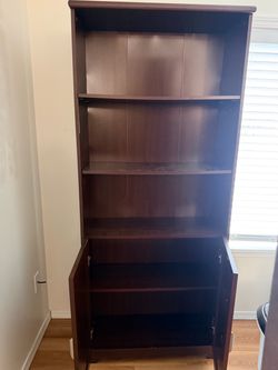 2 Brown books shelves