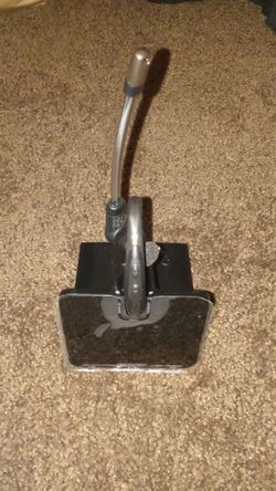 A wireless black headset
