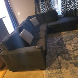 2 Piece grey sectional with chase