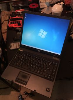 Hp nx6125 laptop win7 office good battery. Perfect