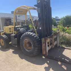 2 Large Forklifts 