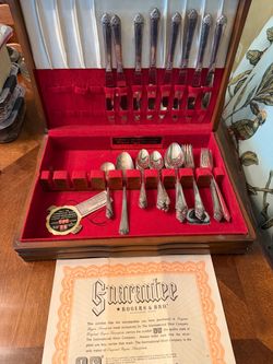 Vintage set of silver plated silverware in original box and paperwork