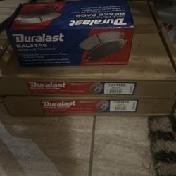 Duralast 2 Rotors and set of brake pads from Jeep Wrangler Unlimited