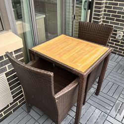 3-Piece Wicker Outdoor Dining Set Acacia Wood Table Top with Off White Cushions On Chairs