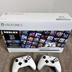Xbox one S + 2 wireless controllers + 4 games